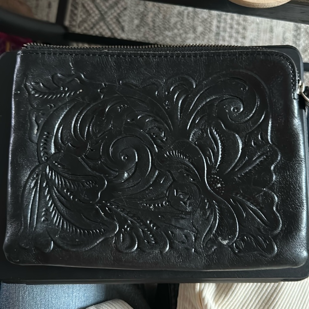 Excellent, preowned condition black tool leather by Patricia Nash